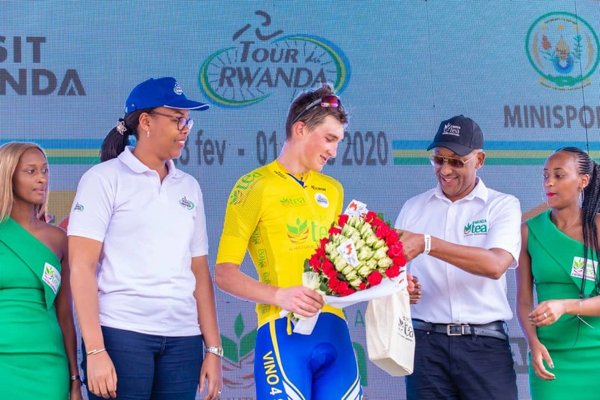 Samuel Mugisha (L), seen here with teammate Joseph Areruya before starting Stage 2 on Monday, has insisted that the Yellow Jersey is still within reach for Rwandan riders. / Courtesy.