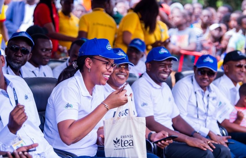 Samuel Mugisha (L), seen here with teammate Joseph Areruya before starting Stage 2 on Monday, has insisted that the Yellow Jersey is still within reach for Rwandan riders. / Courtesy.