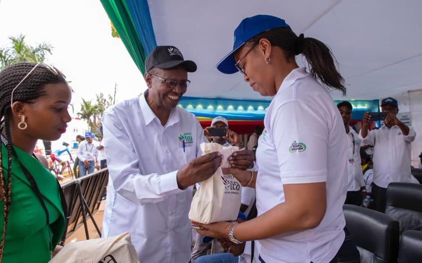 Samuel Mugisha (L), seen here with teammate Joseph Areruya before starting Stage 2 on Monday, has insisted that the Yellow Jersey is still within reach for Rwandan riders. / Courtesy.