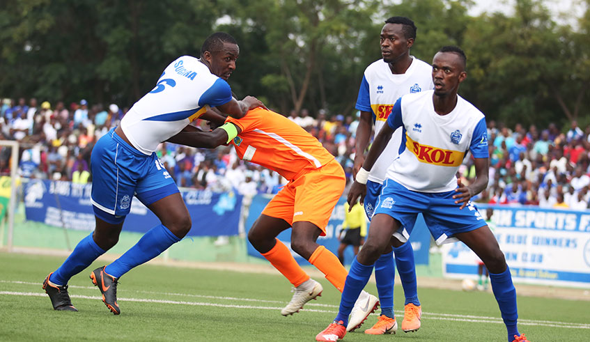 Rayon Sports players battle for the ball during the league match against AS Kigali. / Sam Ngendahimana.