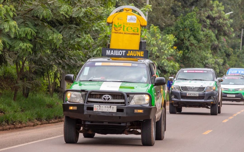 Samuel Mugisha (L), seen here with teammate Joseph Areruya before starting Stage 2 on Monday, has insisted that the Yellow Jersey is still within reach for Rwandan riders. / Courtesy.