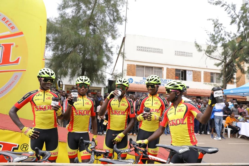 Samuel Mugisha (L), seen here with teammate Joseph Areruya before starting Stage 2 on Monday, has insisted that the Yellow Jersey is still within reach for Rwandan riders. / Courtesy.