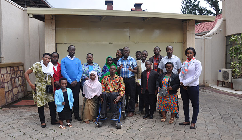 Esther Mukampogazi (2nd right) encourages people living with disabilities to be resilient. 