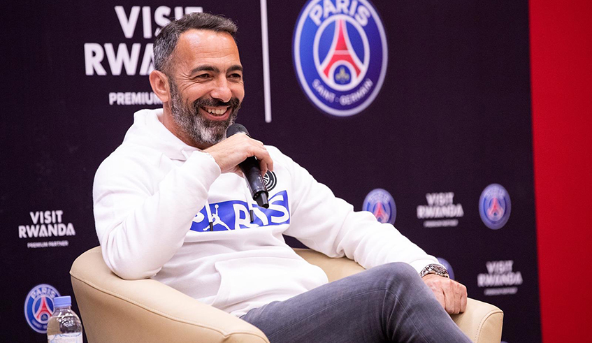 Youri Djorkaeff won the 1998 World Cup and 2000 Euro with France. He is seen here speaking to PSG fans in Rwanda during a Meet-and-Greet session at Kigali Convention Centre on Tuesday. / Courtesy photo.