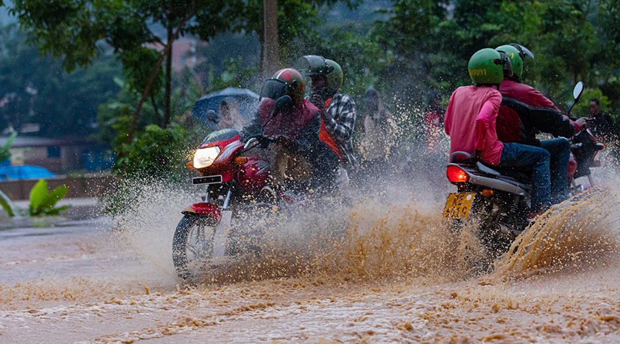Motorists wade through a flooded road during heavy rainsu00a0in Kigali. The recent heavy rains have killed 53 and injured 84 since the start of the year. 