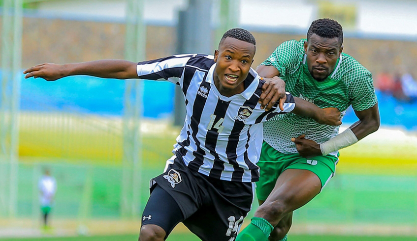 Lague Byiringiro (#14), seen here in a past match against SC Kiyovu at Kigali Stadium, was one of the four scorers during APRu2019s thumping 4-0 win over Mukura on Saturday. / File.