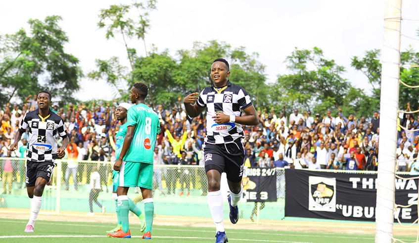 APR FC striker Innocent Nshuti (right) celebrates his lone goal during the league match against SC Kiyovu at Kigali Stadium yesterday. / Sam Ngendahimana.