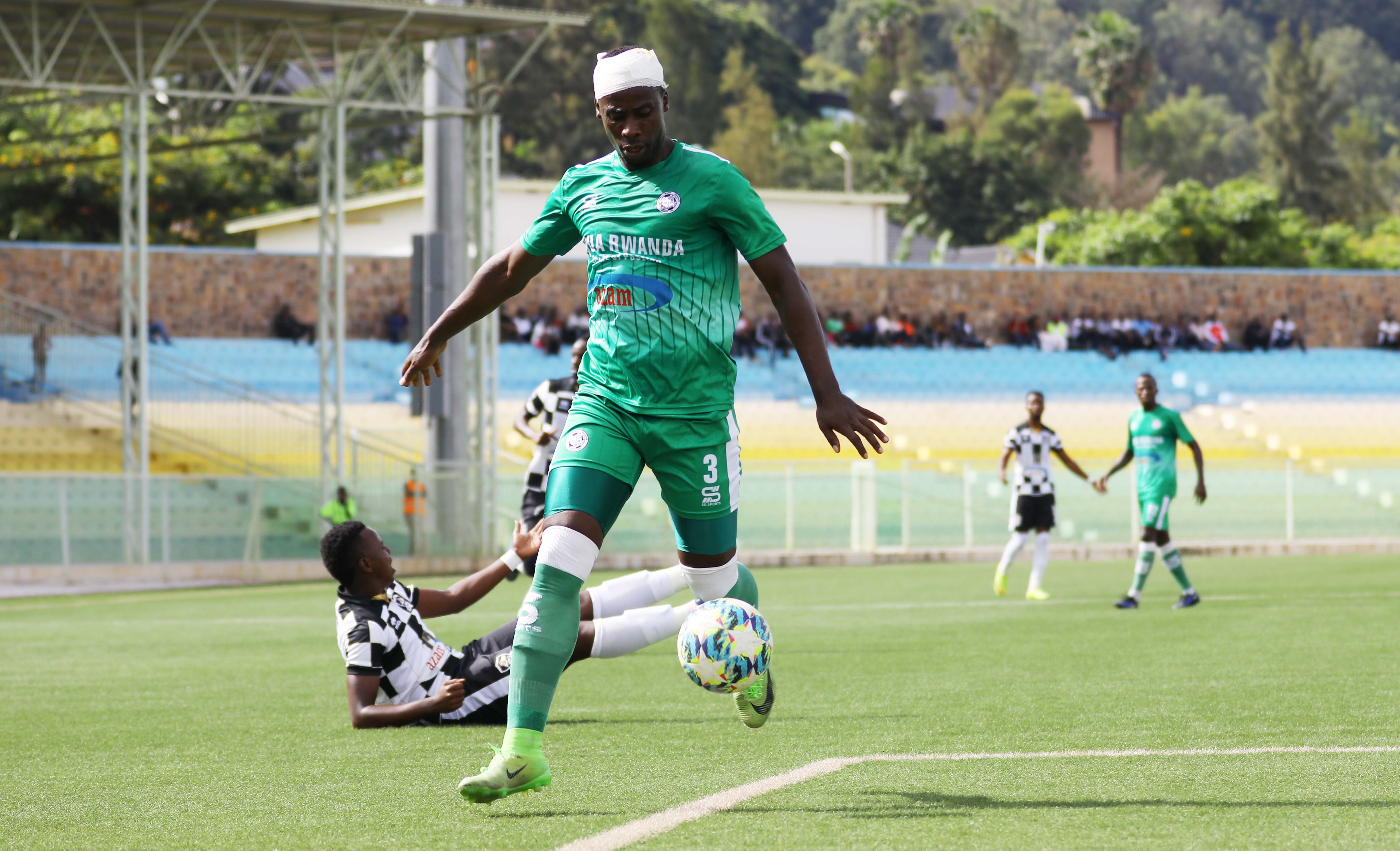 APR FC striker Innocent Nshuti (right) celebrates his lone goal during the league match against SC Kiyovu at Kigali Stadium yesterday. / Sam Ngendahimana.