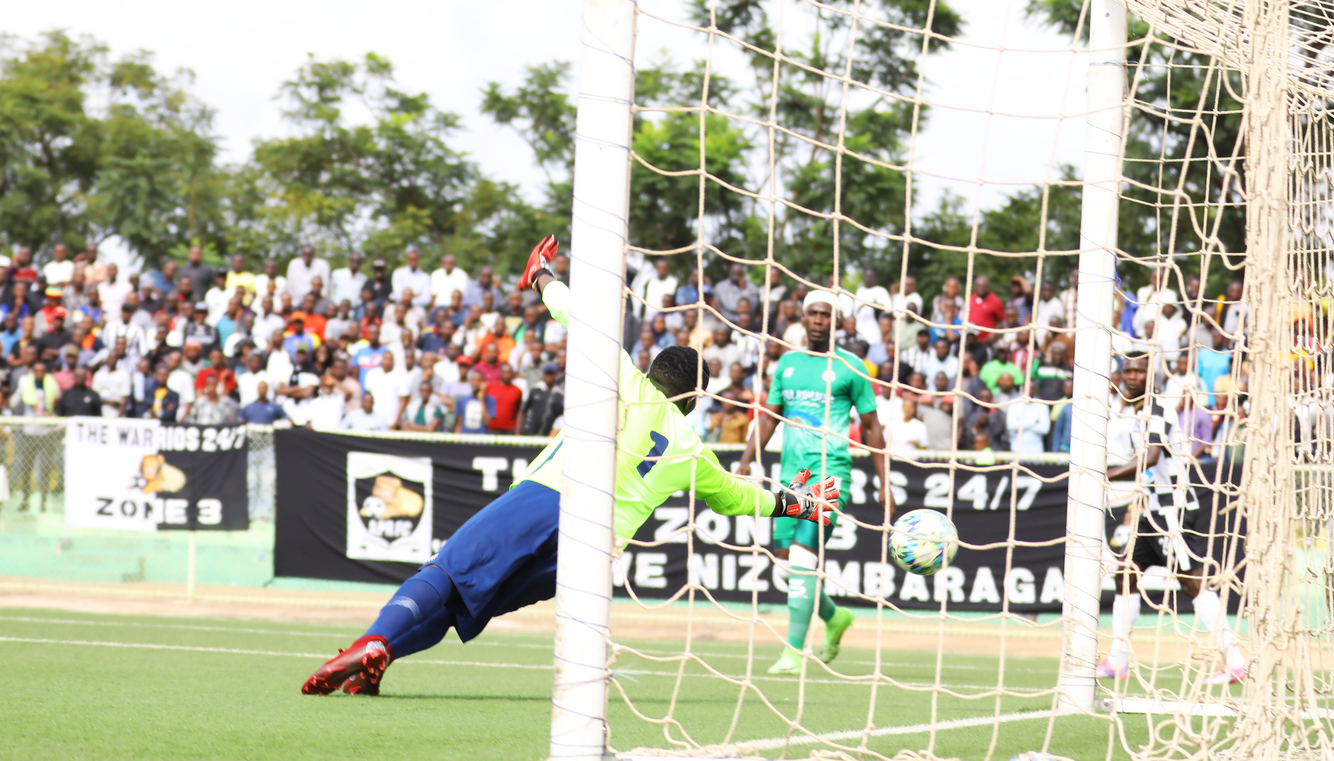 APR FC striker Innocent Nshuti (right) celebrates his lone goal during the league match against SC Kiyovu at Kigali Stadium yesterday. / Sam Ngendahimana.