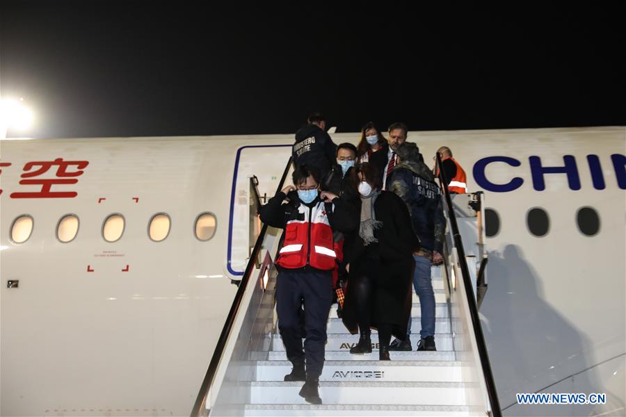 Members of a Chinese aid team arrive at Fiumicino Airport in Rome, Italy, on Match 12, 2020. A charter flight carrying a nine-member Chinese aid team, along with tonnes of medical supplies, arrived at Fiumicino Airport on Thursday night, in part of China's efforts to help Italy contain the novel coronavirus outbreak. 