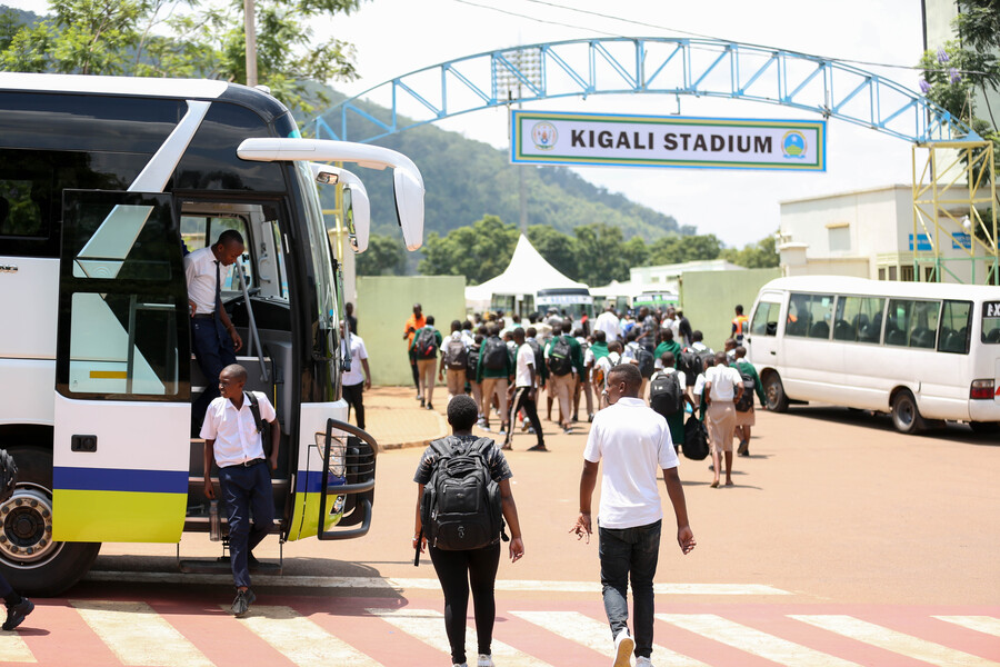 Health practitioners screen students at Kigali Stadium in Nyamirambo after returning from schools to prevent spread of the coronavirus. The Rwanda Utilities Regulatory Authority (RURA), has also directed that the number of passengers on public buses reduce from 70 to 39. / All photos by Dan Nsengiyumva