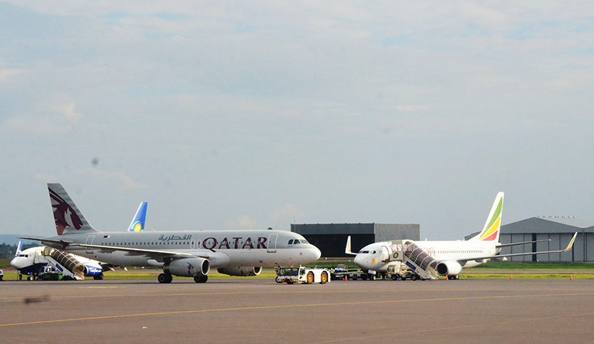 Qatar Airways, RwandAir and Ethiopian Airlines planes at Kigali International Airport. / Photo: Sam Ngendahimana.
