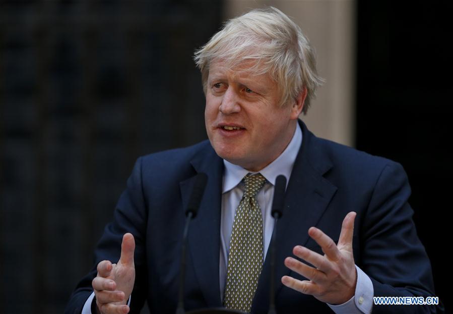 File photo taken on Dec. 13, 2019 shows British Prime Minister Boris Johnson speaking outside 10 Downing Street in London, Britain. British Prime Minister's Office said on Friday that Prime Minister Boris Johnson had tested positive for coronavirus. 
