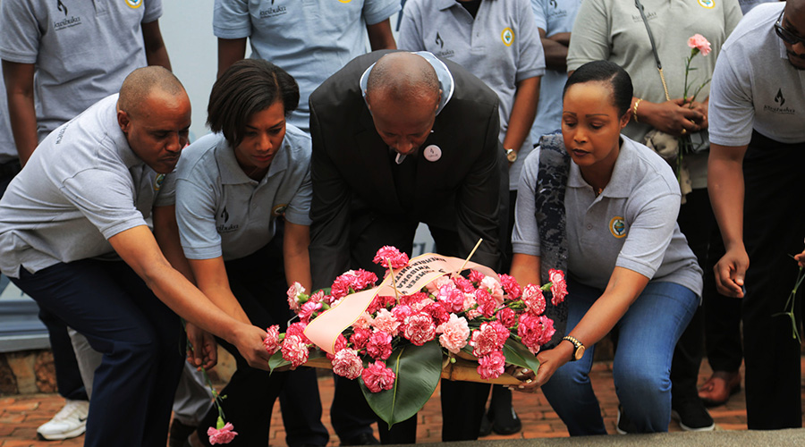 Staff from Rwanda Association of Petroleum Product Importers lay wreath at Kigali Genocide Memorial last year. 