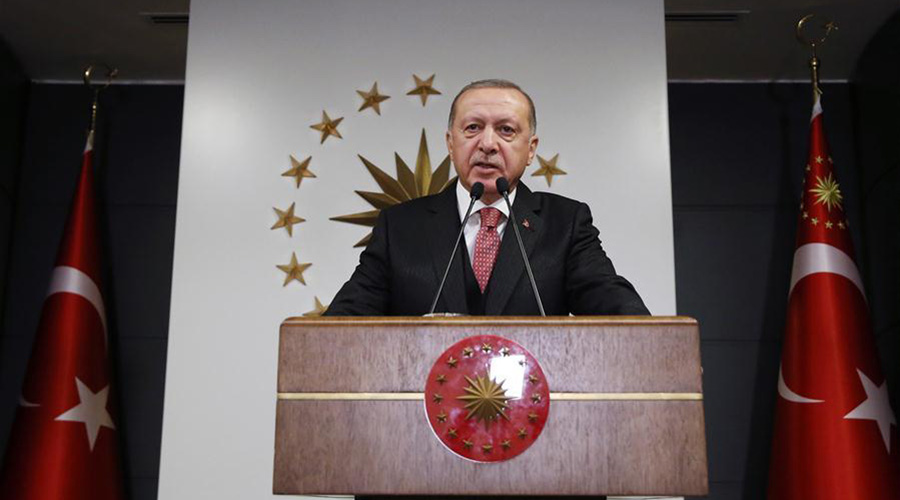Turkish President Recep Tayyip Erdogan delivers a televised address to the nation in Istanbul, Turkey, on March 30, 2020. Erdogan on Monday said a total of 39 locations across the country are put under quarantine due to the rising number of confirmed cases for COVID-19. 