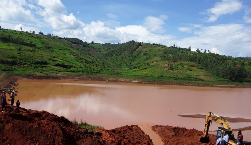 Excavation works in the ongoing activities to exhume bodies of victims of the 1994 Genocide against Tutsi in Ruramira water dam in Kayonza District. So far, 15 bodies have been exhumed. / Photo: Courtesy.
