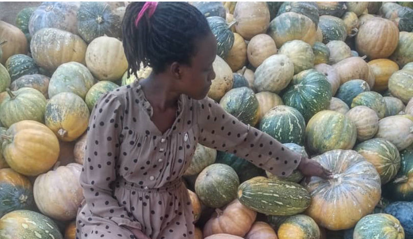 Mukagahima sorts out pumpkins to be used at her enterprise. / Courtesy photos.