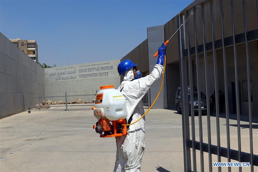 A worker sprays disinfectant in the Grand Egyptian Museum (GEM) in Giza, Egypt, on April 13, 2020. Egypt reported on Monday 125 new COVID-19 infections and five deaths, bringing the death toll in the country to 164, while the number of the confirmed cases jumped to 2,190. (Xinhua/Ahmed Gomaa)