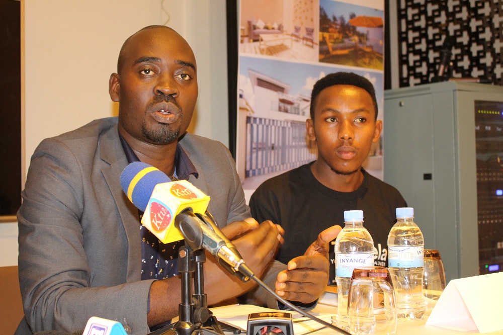 Alphonse Nsengiyumva (left), the representative of SupraVoice speaking at a past event in Kigali. 