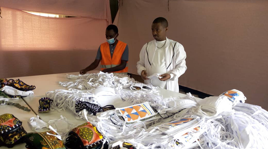 Workers at a local textile factory in Kigali, which makes face masks. The 22 local firms that have been authorised to manufacture the masks are expected to meet the high demand after the Government ordered compulsory wearing of face masks. 