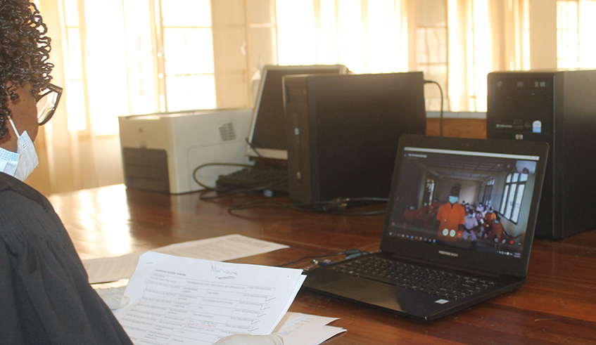 A judge delivers a court ruling through Skype at the Intermediate Court of Nyarugenge in Kigali on Monday, April 20. /  Photo: Courtesy.