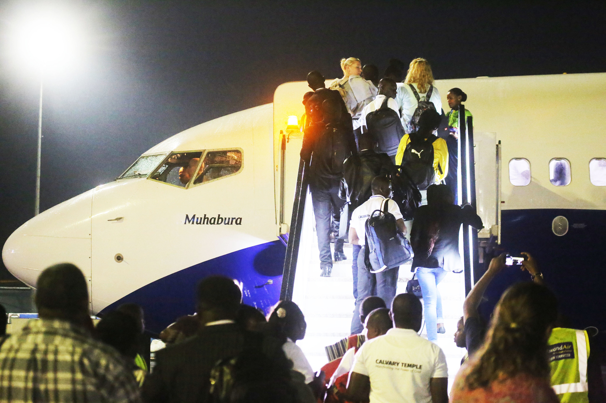 Passengers boarding RwandAir's plane at the launch of Kigali -Tel Aviv route last year. According to ICAO, Globally, the coronavirus pandemic could mean 1.2 billion fewer international air travellers by September 2020. 