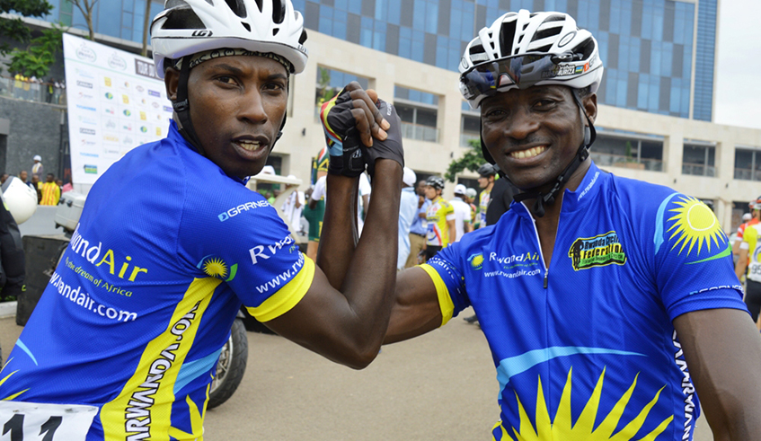 Nathan Byukusenge (L) and Abraham Ruhumuriza retired from competitive cycling in 2017 and 2016, respectively. Ruhumuriza won Tour du Rwanda a record five times before it turned international in 2009. / File.