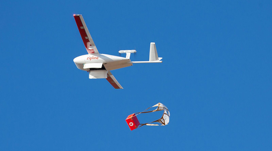 A Zipline drone drops emergency blood delivery at a remote hospital in Rwanda. Due to COVID-19 outbreak, Butaro Hospital has partnered with Zipline to extend cancer care services closer to where patients live. 