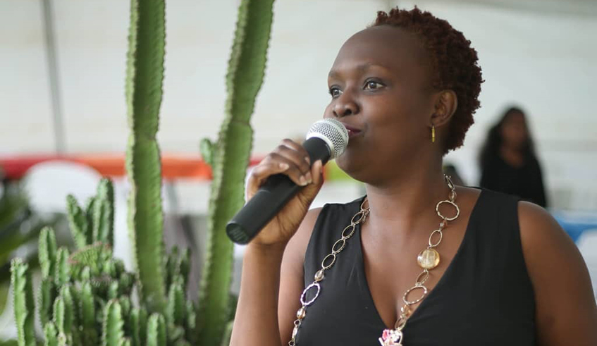 Jackie Lumbasi emceeing a corporate event in Kigali, last year. / Courtesy photo.