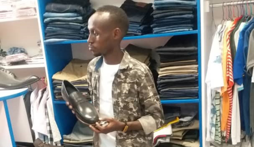 Clement Gutunga in his boutique. / Lydia Atieno.