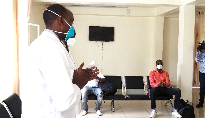 Dr Sabin Nsanzimana, the Director General of Rwanda Biomedical Centre, speaks to the first batch of COVID-19 patients who were discharged at Kanyinya Health Centre in Nyarugenge District on April 5, 2020. Photo: / File.