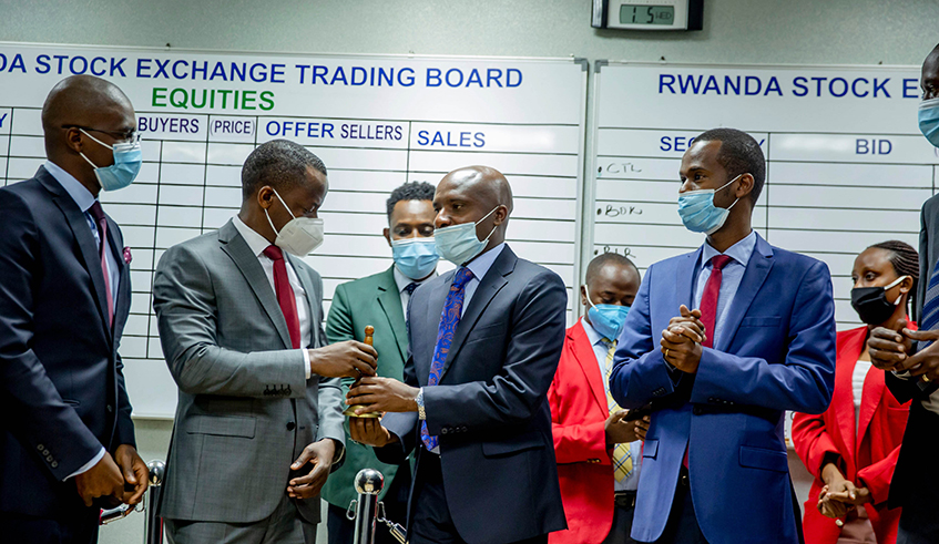 Officials ring the bell during an event to cross-list RH Bophelo on the Rwanda Stock Exchange in Kigali on Monday, June 1. / Photo: Courtesy.