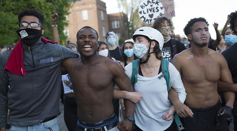 Protestors demonstrate against the death of George Floyd in Minneapolis, the United States, May 31, 2020. 