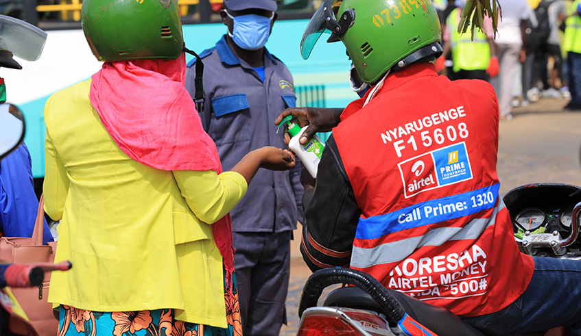 For some taxis moto operators they first use hand sanitizer for their clients For some taxis moto operators they first use hand sanitizer for their clients