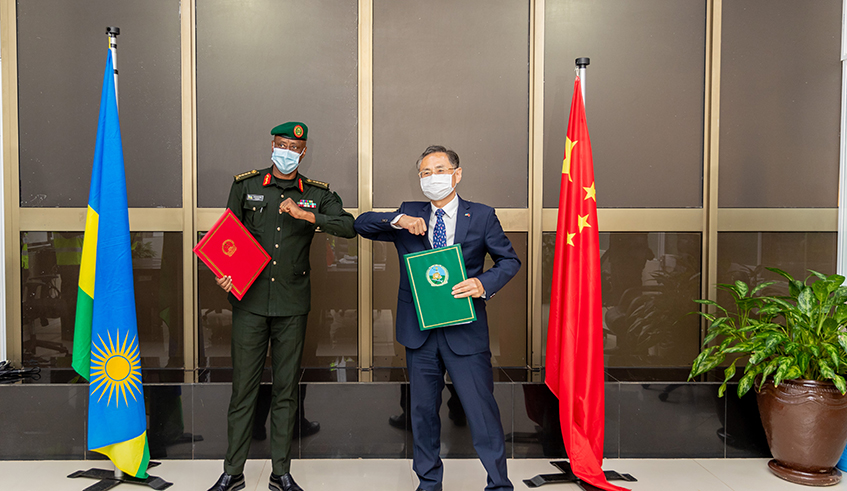 Gen. Jean Bosco Kazura, Rwandaâ€™s Chief of Defence Staff and Rao Hongwei the Chinese ambassador to Rwanda after signing the handover in Kigali on 3 June 2020 