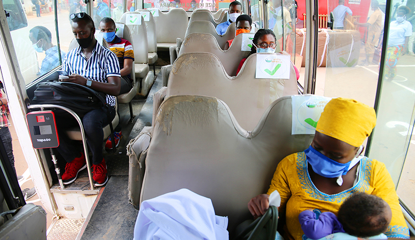 Inside the bus, travellers were sitting by respecting physical distancing 