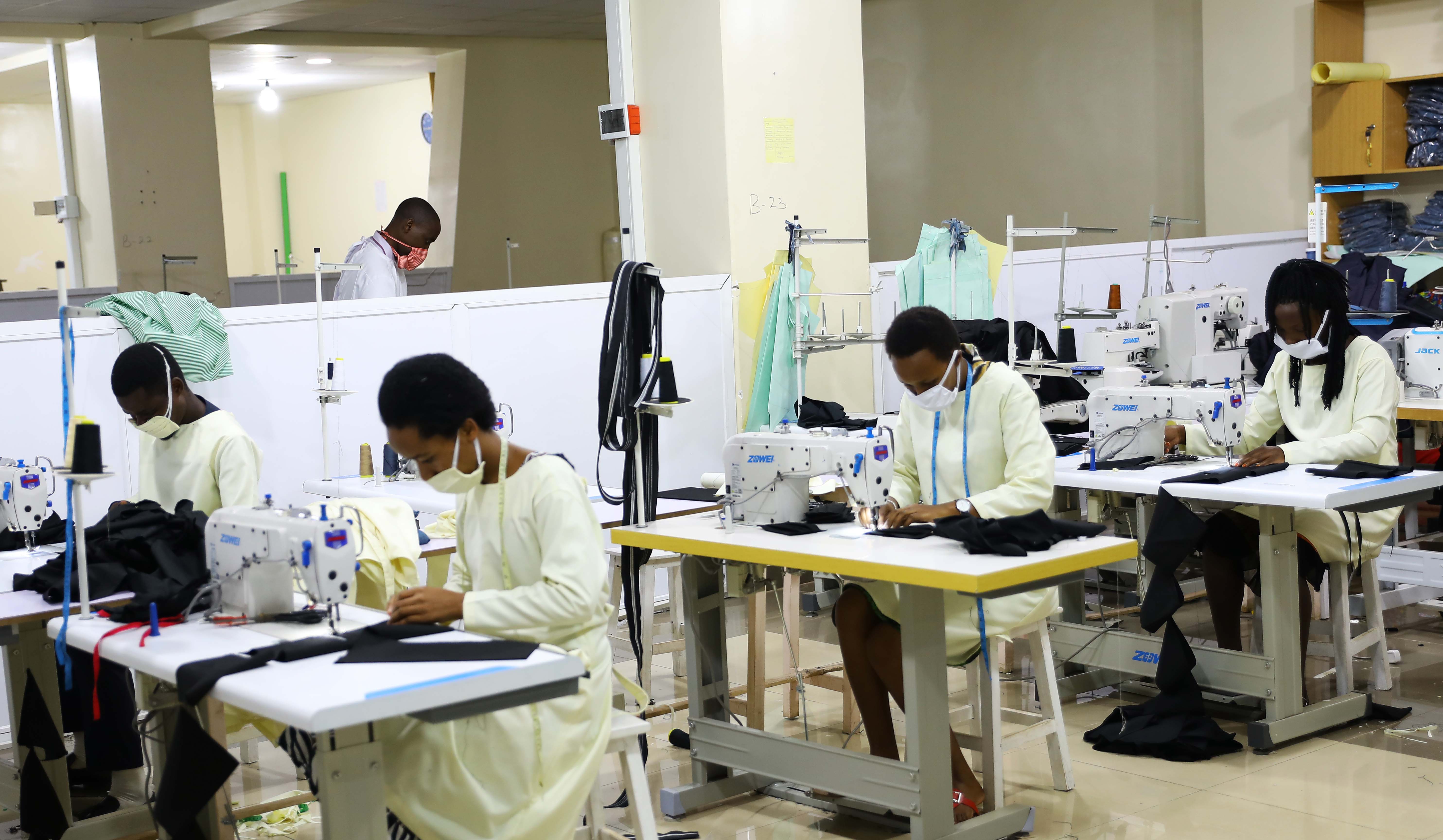 Workers at Apparel Manufacturing Group Ltd make facemasks in Kigali recently. The central bank has issued guidelines on disbursement of funds meant to accelerate rebound of businesses hit hardest by the Covid-19 pandemic. 