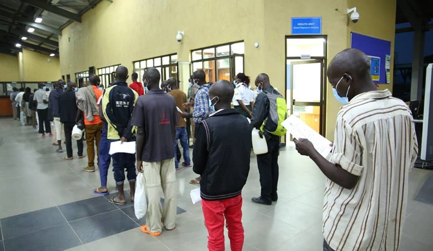 Some of the Rwandans who were released by Uganda go through immigration clearance at the Kagitumba One-Stop Border Post on Monday, June 8. /  Photo: Dan Nsengiyumva.