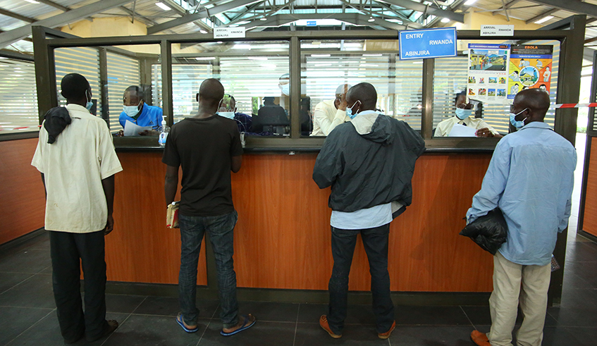 Some of the Rwandans who were released by Uganda go through immigration clearance at the Kagitumba One-Stop Border Post on Monday, June 8. /  Photo: Dan Nsengiyumva.