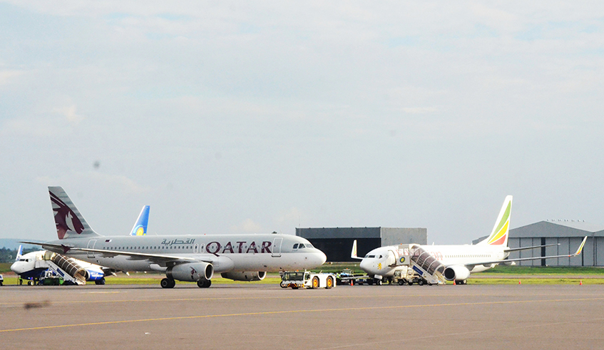 RwandAir, Qatar Airways and Ethiopian Airlines planes at Kigali International Airport. / Photo: Sam Ngendahimana.
