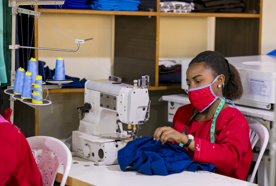 A woman at work at Weya Creations Garment Factory in Kigali. Through its â€˜Open Calls Programmeâ€™, the National Industrial Research and Development Agency (NIRDA) is helping garment manufacturers to upgrade their equipment. / Photo: Courtesy