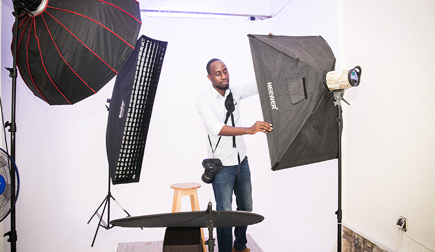 Angelo setting up a photoshoot in the new studio.