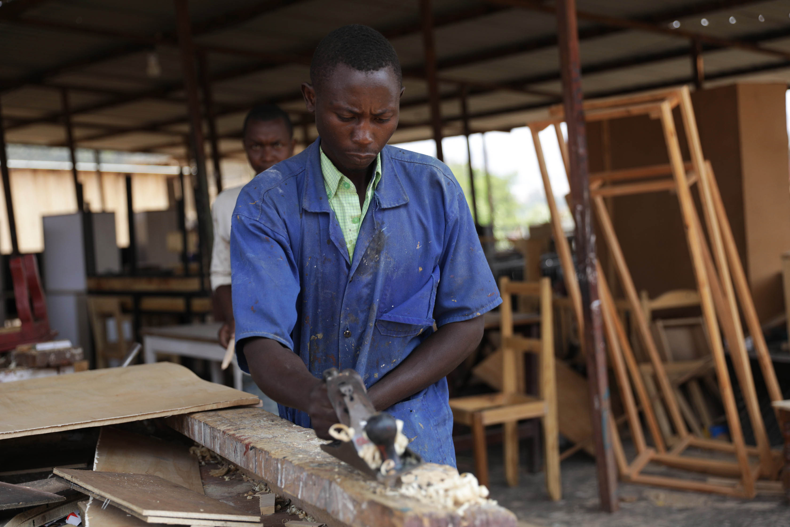 Youth carpenters of Ubuzima Bushya Iwacu cooperative at work in Agakiriro in Kacyiru Sector, Kigali on September 2, 2019. / Sam Ngendahimana