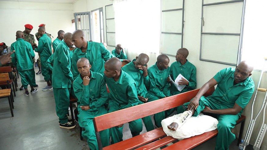 Retired Major Habib Mudathiru and his co-accused group in the court. The group of 25 were all captured last year in terrorism activities in DR Congo. 