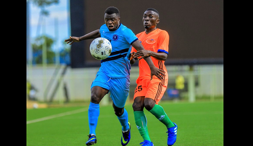 Right-back Mohamed Mpozembizi (L) joined Sunrise last week, bringing an end to his four-year stint with Police. Here he is seen vying for the ball during a past league match against Gicumbi at Kigali Stadium in October. / Courtesy photo.