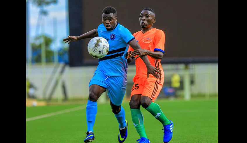 Right-back Mohamed Mpozembizi (L) joined Sunrise last week, bringing an end to his four-year stint with Police. Here he is seen vying for the ball during a past league match against Gicumbi at Kigali Stadium in October. / Courtesy photo.
