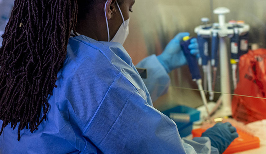 A scientist carries out research in a lab. A group of researchers at Rwanda Biomedical Centre (RBC) recently discovered that a standard algorithm that has been used to diagnose provides faulty results. / Photo: File.