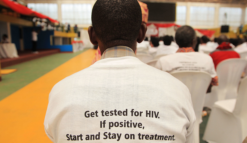 A man in a T-shirt with an awareness message on HIV testing during a meeting in Kigali in 2017. / Photo: File.
