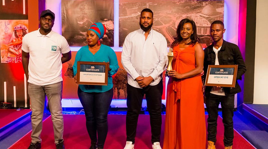 MNI winners with MNI team pose for a group photo during the ceremony. Scott Gaga Butera, Claire Mutimawurugo, Denis Rwema, Tonzi and Bryan Lead (right). / Courtesy