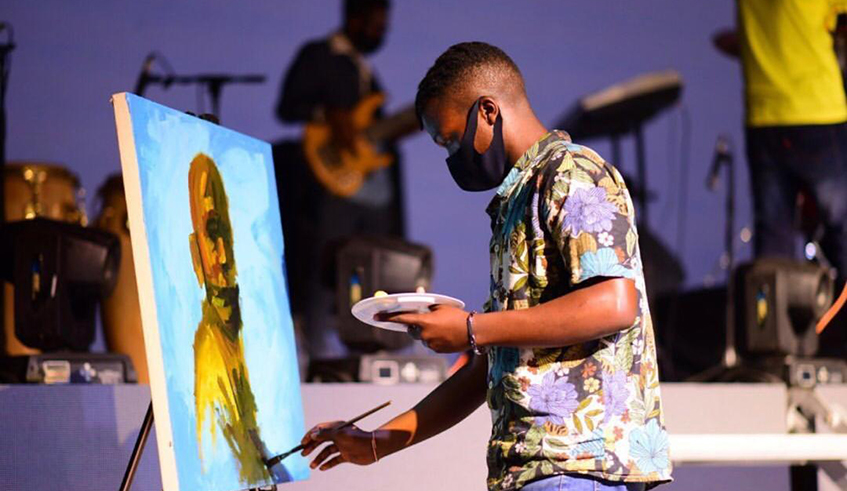 visual artist Antoinne Izere showcases his talent on the first day of Iwacu Muzika festival